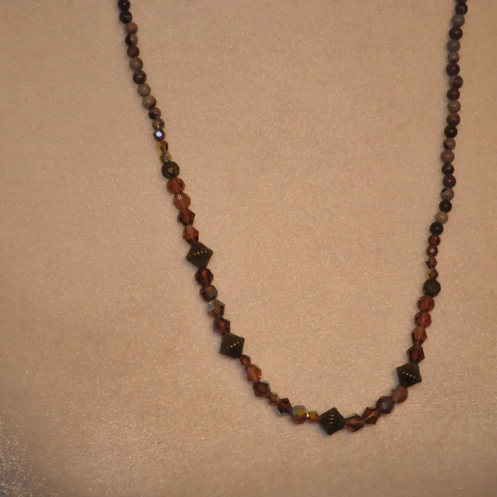 NWT Elegant Brown Necklace with Intricate Pendant Design